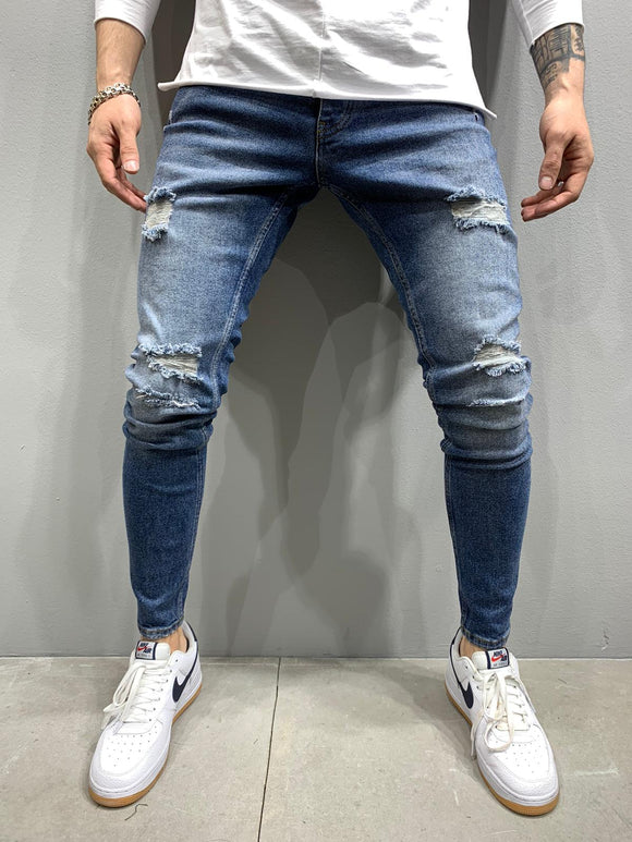 Blaue Skinny-Jeans mit Rissen AY780