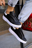 Schwarz-weißer Sneaker CH092